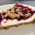 A delicious plate of Berry Crumble Cheesecake