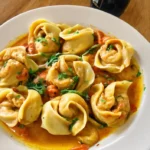 A delicious plate of One-Pot Spicy Garlic Butter Chicken Tortellini