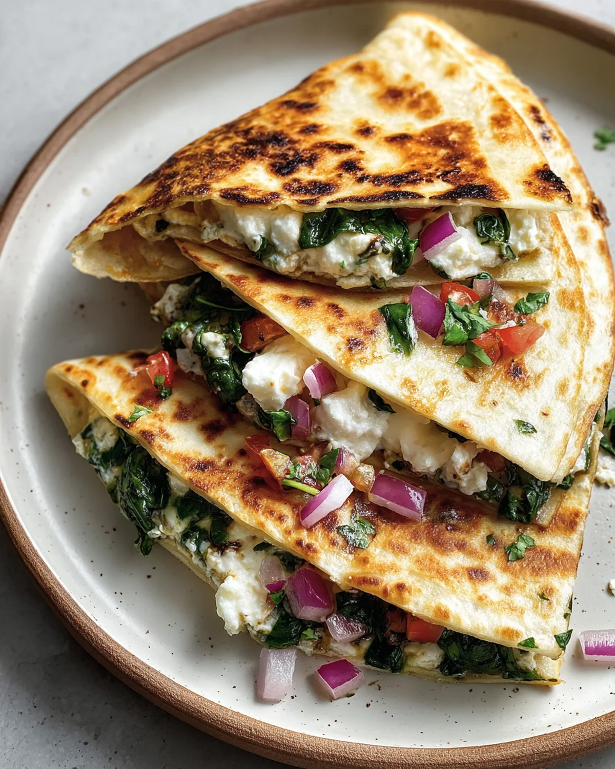 Mediterranean Quesadillas with Spinach, Feta, Mozzarella, and Red Onion - Image 2