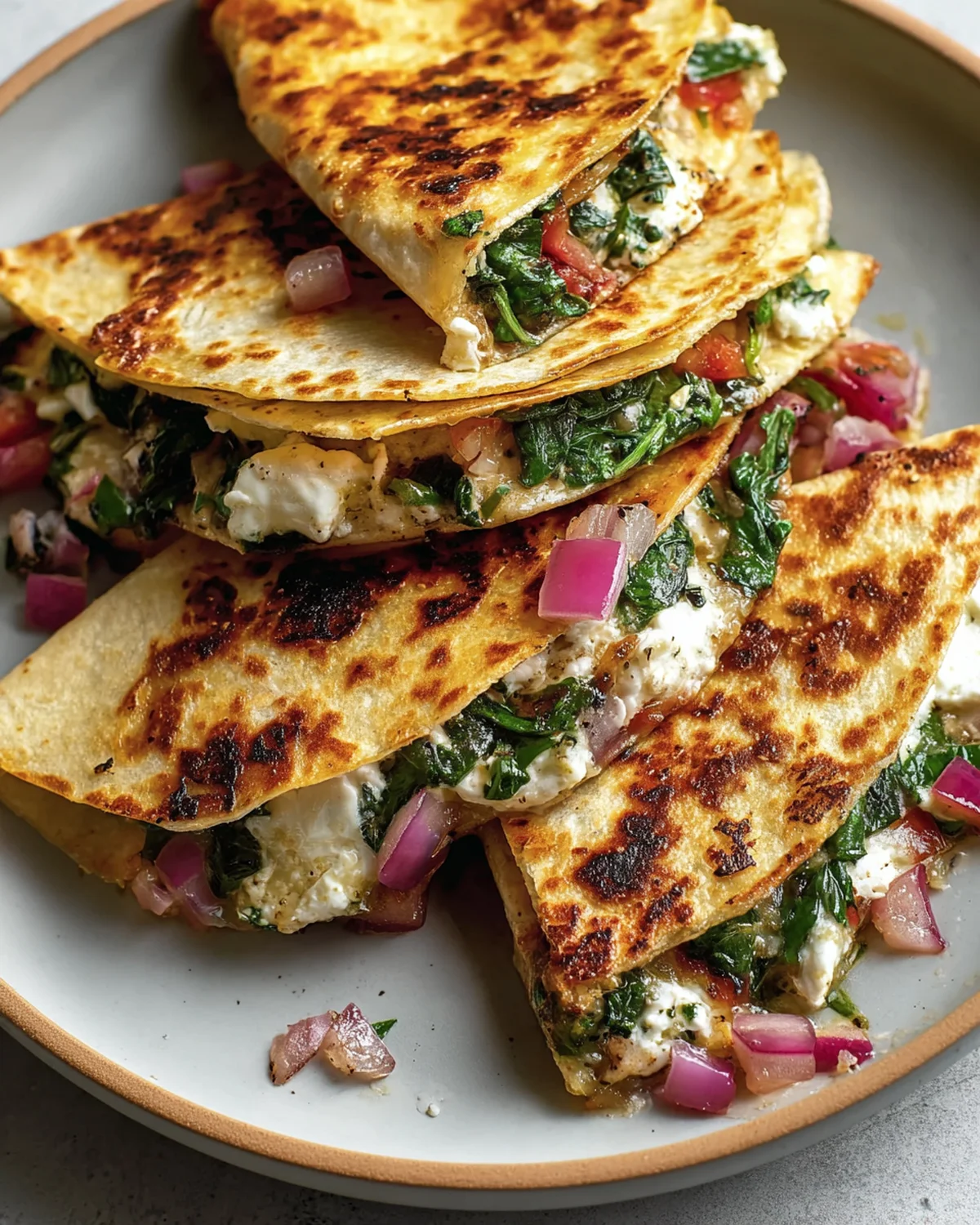 Mediterranean Quesadillas with Spinach, Feta, Mozzarella, and Red Onion - Image 4